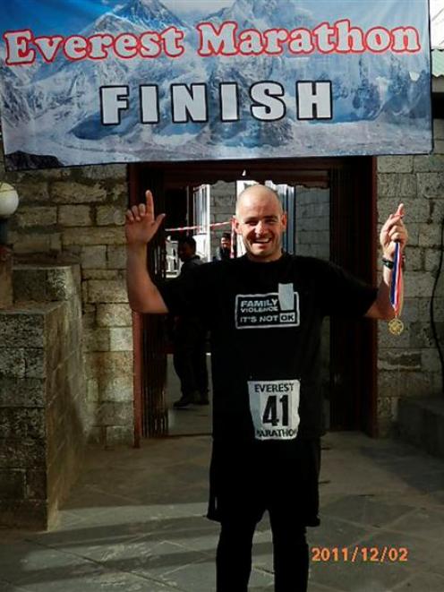 Queenstown man Martin O'Malley at the finish line of the 42km Everest Marathon, the world's...