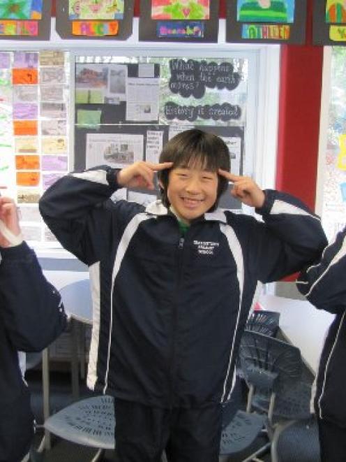 Queenstown Primary School pupils (from left) Jasmine Addie, Terry Kim and Bonnie Joans. Photo by...