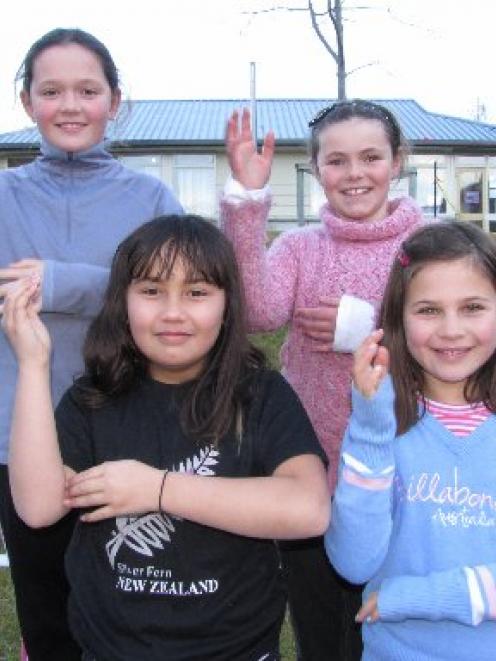 Queenstown Primary School pupils (from left) Zak Komene (10), Macy Te Whaiti (9), Isabella Jack ...