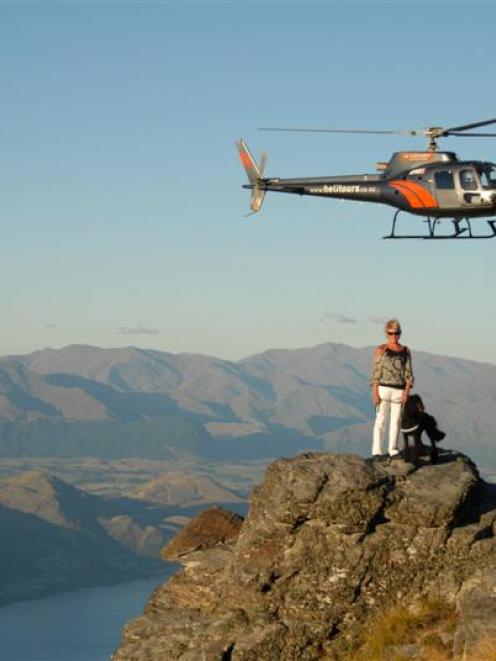 Queenstown's Jenny McBride and her guide dog Freda get a taste of what is on offer during the...
