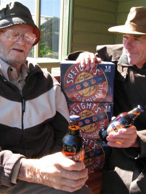 Queenstown's Paddy Mathias (left) and mate Lyall Smillie celebrate winning a year's supply of...