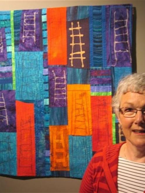 Queenstown textile artist Alison Naylor with a piece of work similar to the one that went missing...