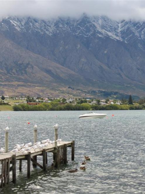 Queenstown woke to a dusting of snow on the peaks of the Wakatipu basin, including the...