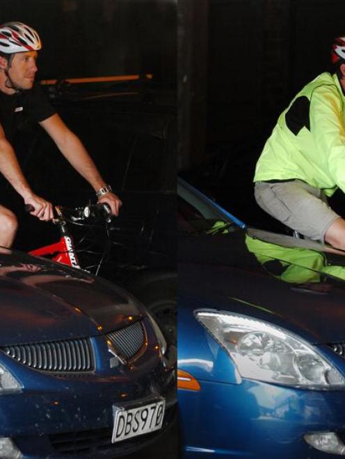 R&R Sport sales assistant Bryn Barnett demonstrates the effectiveness of a fluorescent and...