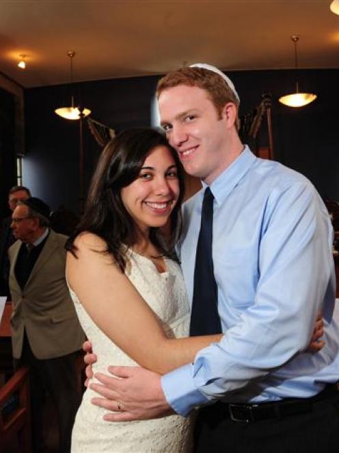 Rachel Freedenberg (26) and Dieter Leibold (30), of California, are married in a Jewish ceremony...