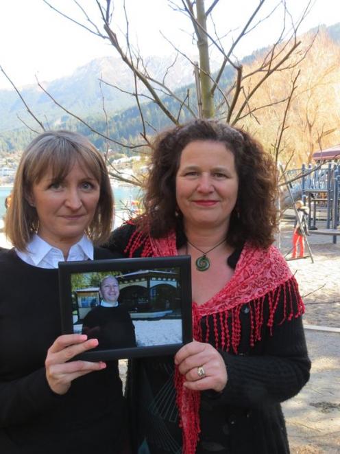 Rachel Rose (left) and Belinda Crichton stand in front of a liquidambar planted in Queenstown Bay...