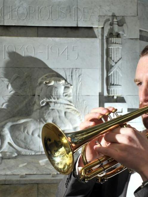 Ralph Miller, at Dunedin's Cenotaph yesterday, says Anzac Day is the bugler's busiest day of the...