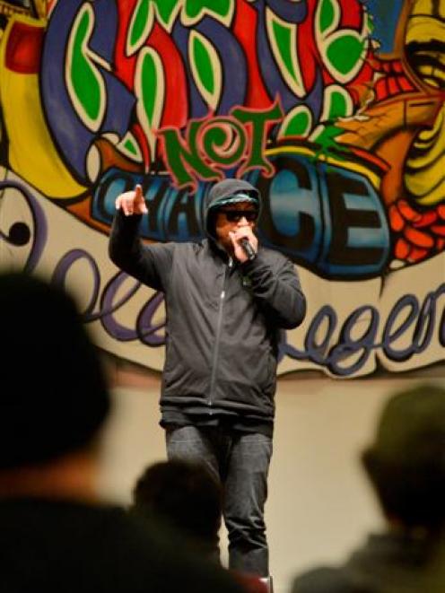 Rapper Scribe delivers his anti-gambling message in the Glenroy Auditorium yesterday. Photo by...