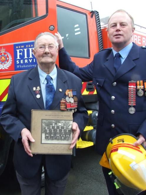 Raymond Burleigh and his father Bruce Burleigh at the Milton fire station. Including the service...