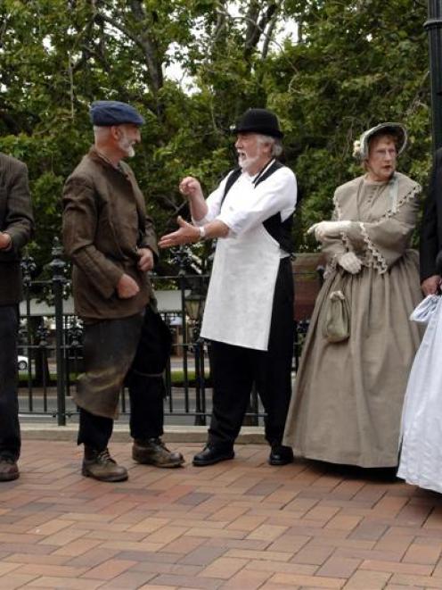 Ready to transform Dunedin's Octagon into a shantytown on Saturday are (from left) Sofie Welvaert...