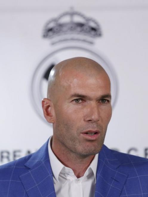 Real Madrid coach Zinedine Zidane appears before the media at Santiago Bernabeu stadium in Madrid...