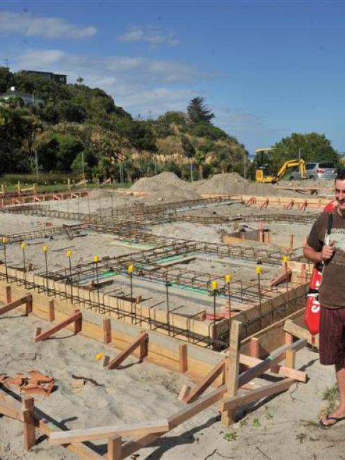 Rebuild committee convener Scott Weatherall on the build site at the new Brighton Surf Life...