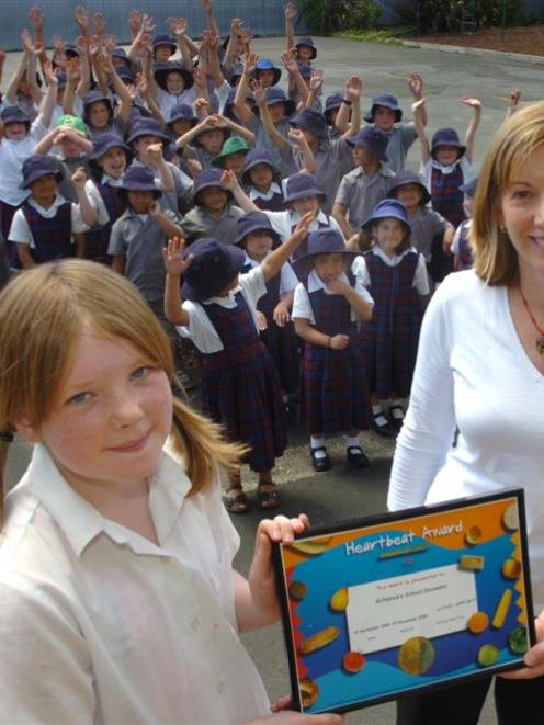 Receiving the Heart Foundation's Gold Heartbeat Award for healthy eating on behalf of St Patricks...