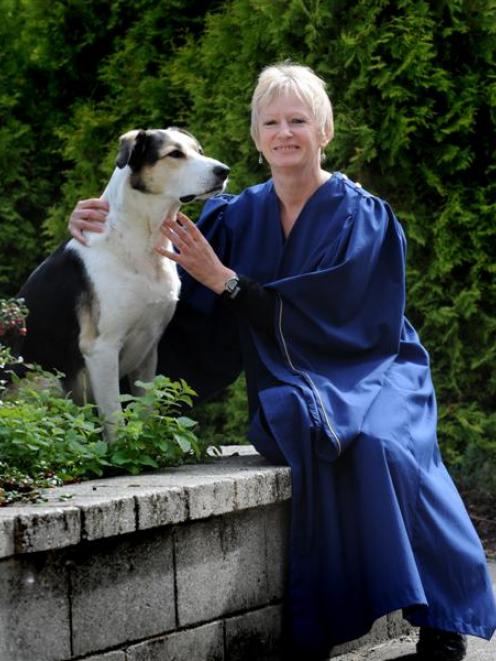 Recently trained rural veterinary technician Carol Adams (51), pictured with 5-year-old huntaway...