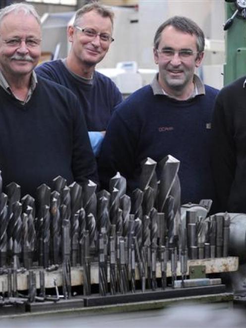 Reflecting on their long service at Dunedin engineering firm DC Ross Ltd, are (from left) chief...