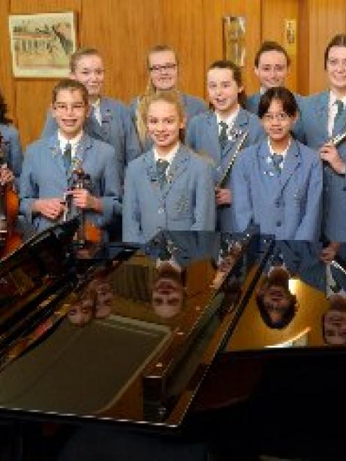 Rehearsing at St Hilda's Collegiate are pupils (from left) Katie Cooper (15), Katie Knowles (15),...