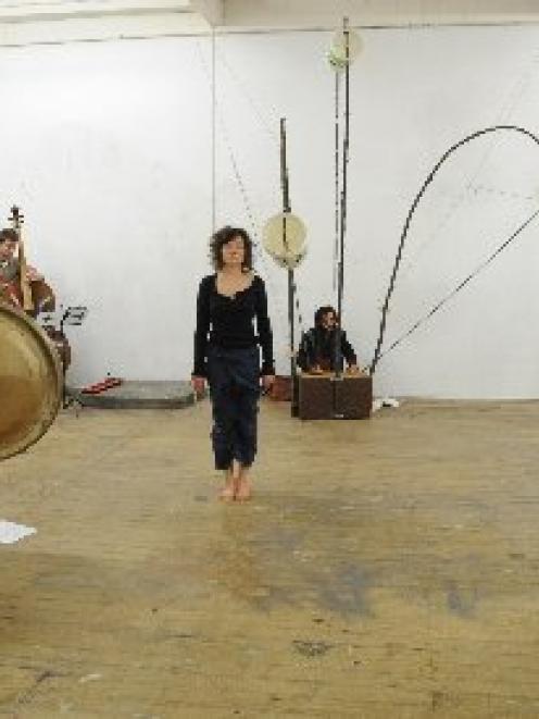 Rehearsing this week for +-=Touch are Motoko Kikkawa, Chris Schmeltz, Richard Scowen (obscured),...
