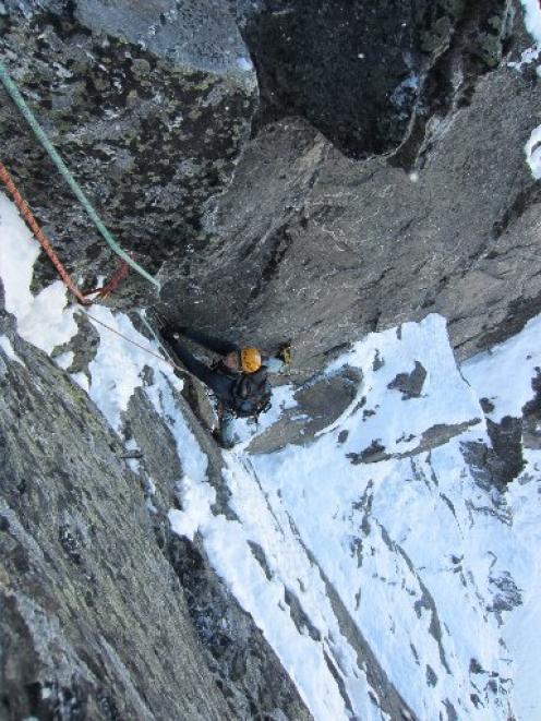 Remarkables Ice and Mixed Festival co-ordinator Daniel Joll, of Queenstown, climbs the first...