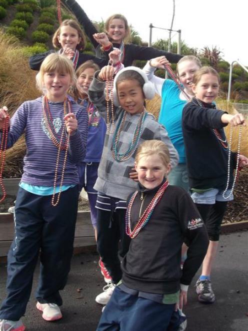 Remarkables Primary School pupils with some of the beads that will be for sale during the ...