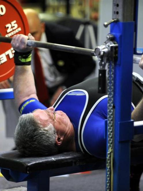 Rennie Soffe, of Dunedin, lifts 217.5kg to set a national record during the national bench press...