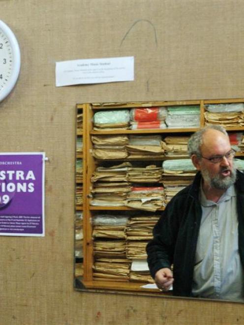 Retired but still making time for Bayfield High School music pupils, Aart Brusse is reflected in...