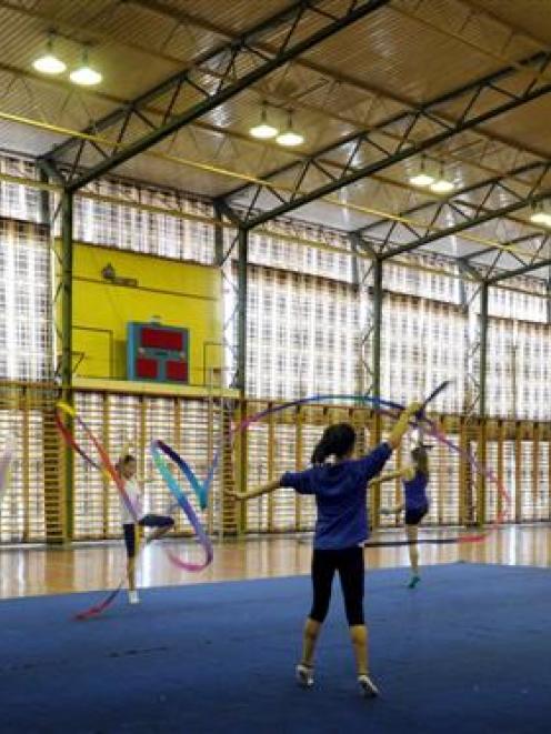 Rhythmic gymnasts train at the Caledonian Gymnasium on Andersons Bay Rd last week. Photo by Craig...