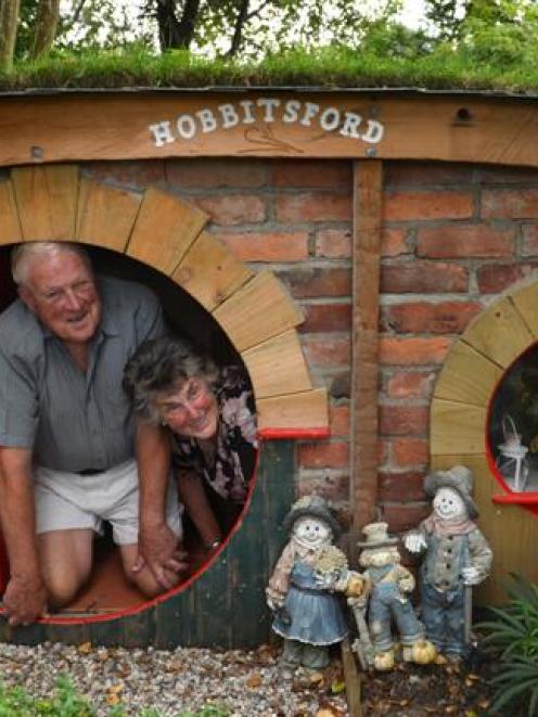 Richard (74) and Myra (71) Wells  occupy the hobbit hole in their  garden. Photo by Peter McIntosh.