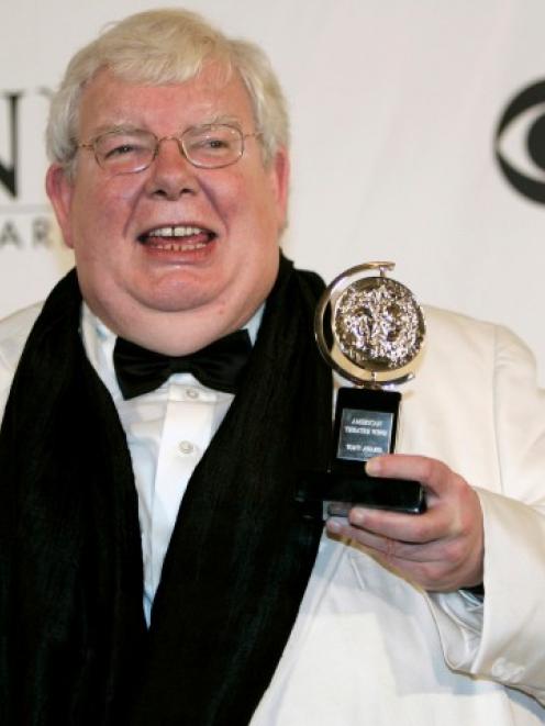 Richard Griffiths poses with his award for Best Performance by a Leading Actor in a Play for The...