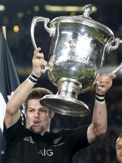 Richie McCaw celebrates the win at Eden Park on Saturday. Photo: Reuters