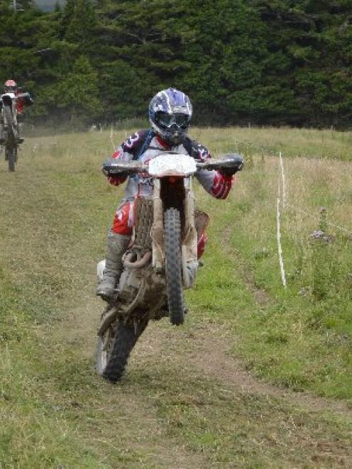 Riders lift their from wheels under power during the Clinton-Kaiwera Trail Ride, near Clinton on...