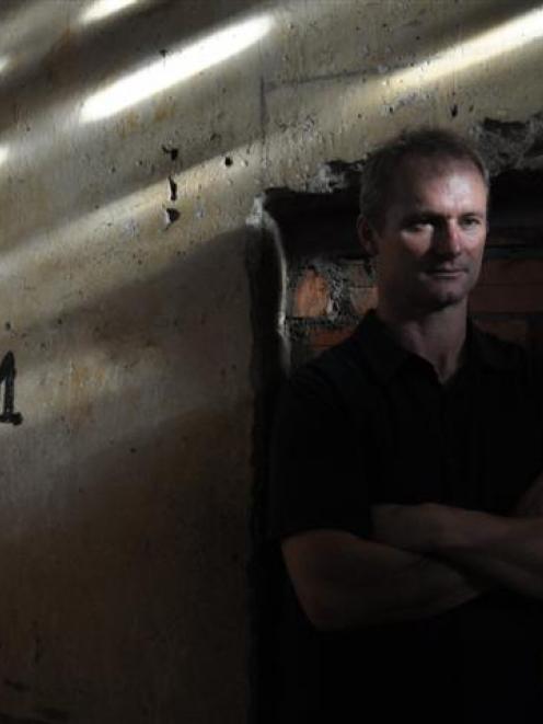 Rob Hamill in a cell at Toul Sleng (S21) prison. Photos supplied.
