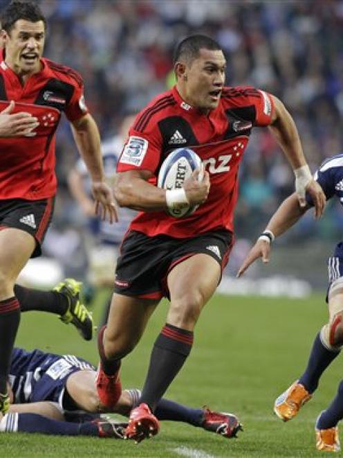 Robbie Fruean of the Crusaders runs with the ball during the Super 15 semifinal against the...