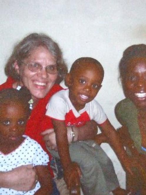 Robyn Couper with some Haitian friends. Photo supplied.