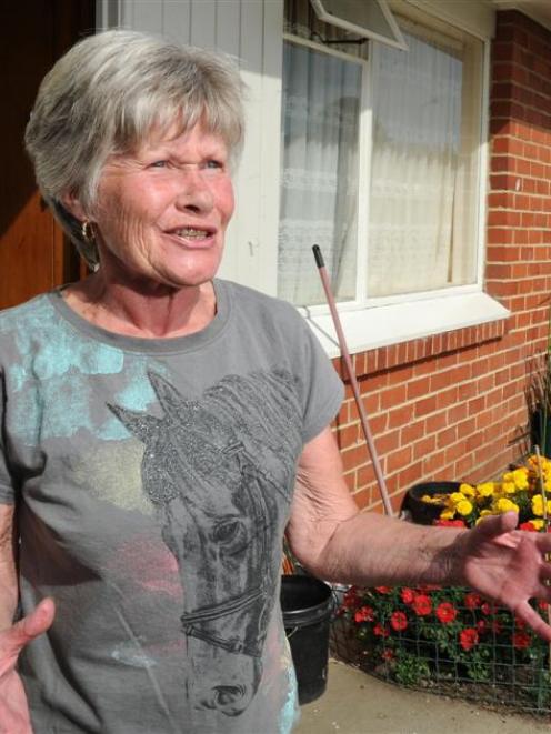 Robyn Swale outside her Dunedin council flat where her tenancy will be reviewed after she fed...