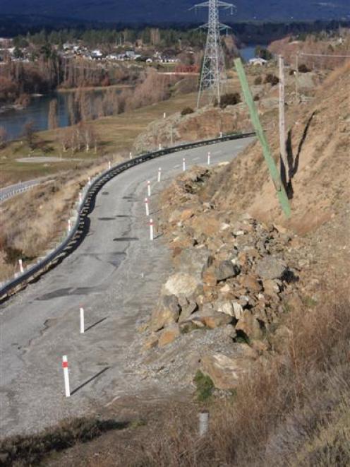 Rocks and debris block  a section of a lane on Fruitgrowers Rd, near Clyde, yesterday. Photo by...