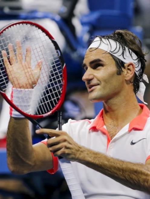 Roger Federer celebrates his victory over Richard Gasquet. REUTERS/Eduardo Munoz