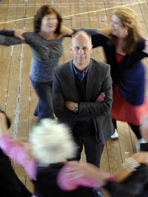 Roger Hall surrounded by actors from his latest play, <i>A Short Cut to Happiness</i>. Photo by...