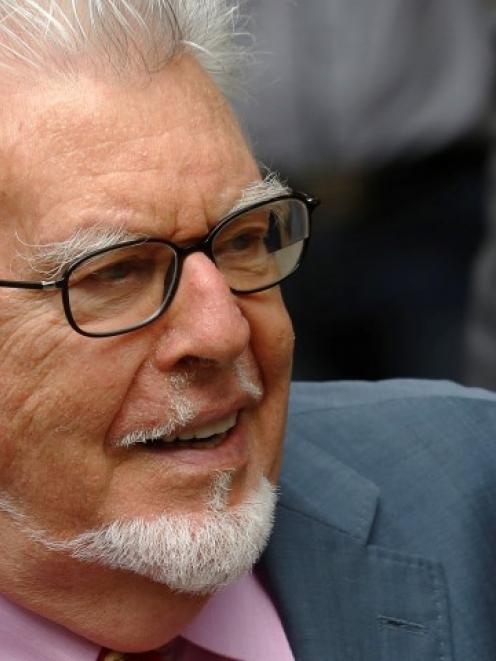 Rolf Harris arrives at Southwark Crown Court in London. REUTERS/Luke MacGregor