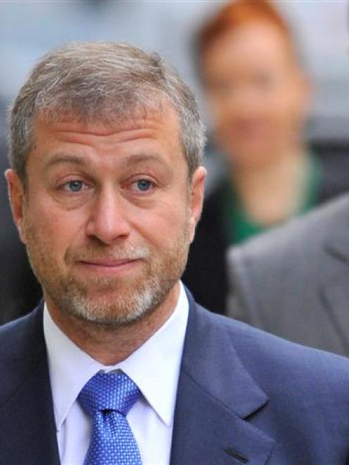 Roman Abramovich arrives at court. REUTERS/Toby Melville