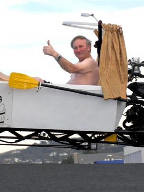 Ross Hanson tries out his "Tubzilla" for size on a cold Dunedin afternoon. Photo by Gregor...