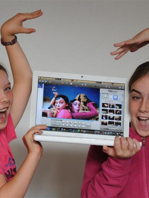 Rotary Park School pupils Blaire Hanna (left) and Ebony James (both 10) use new computer...