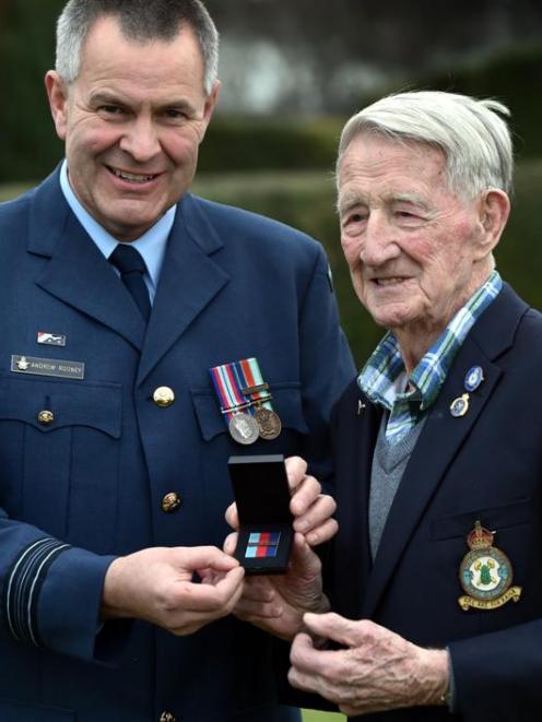 Royal New Zealand Air Force liaison officer and former squadron leader Andrew Rooney (left)...