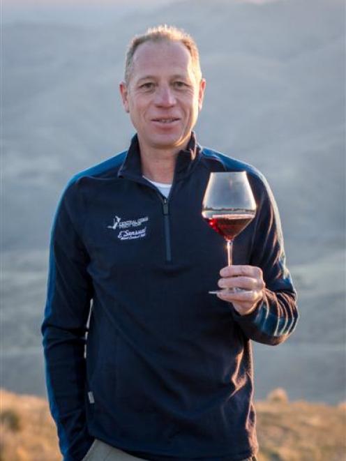 Rudi Bauer, spokesperson for the Central Otago Winegrowers Association, with a wineglass...