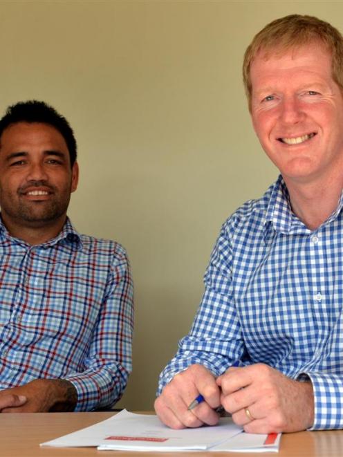 Rueben Skipper (left) and Steve Silvey, from Upstart business incubator, reflect on its merger...