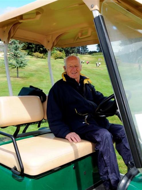 Rules referee Watson Barkman in a typical pose, in the rules golf cart at St Clair yesterday....