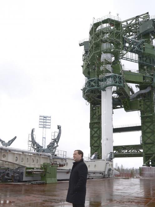 Russia's Prime Minister Dmitry Medvedev inspects the launch pad of the new generation Angara...