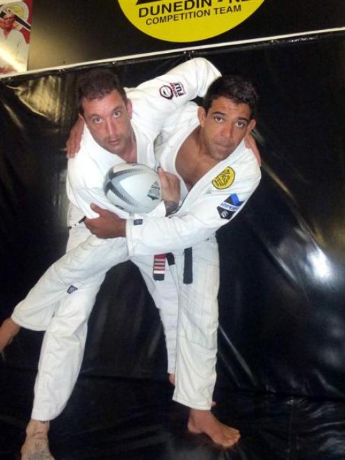 Ryan Henry (left) and Marcos Nevel grapple at the New Zealand Fight and Fitness Academy at the...