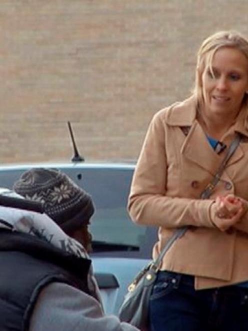Sarah Darling speaks to Billy Ray Harris in this undated image taken from video courtesy of KCTV5...