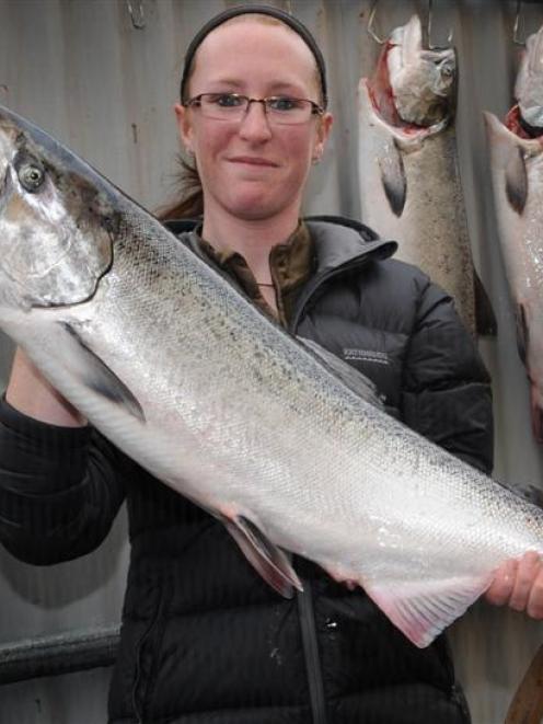 Sarah Hutton shows off the 6.36kg salmon she pulled from Otago Harbour on Saturday to win the...