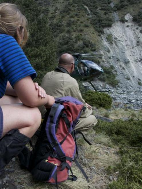 Sarah Martyn and Peter Willemse wait to be picked up from Stony Stream in the Dobson Valley....